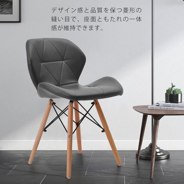 Nordic Eames Modern Dining Chair featuring a curved molded plastic seat with natural wood legs.