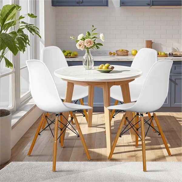 Molded Plastic Eames Dining Chair with a contoured plastic seat and wooden legs, offering modern style and comfort for dining or office spaces.