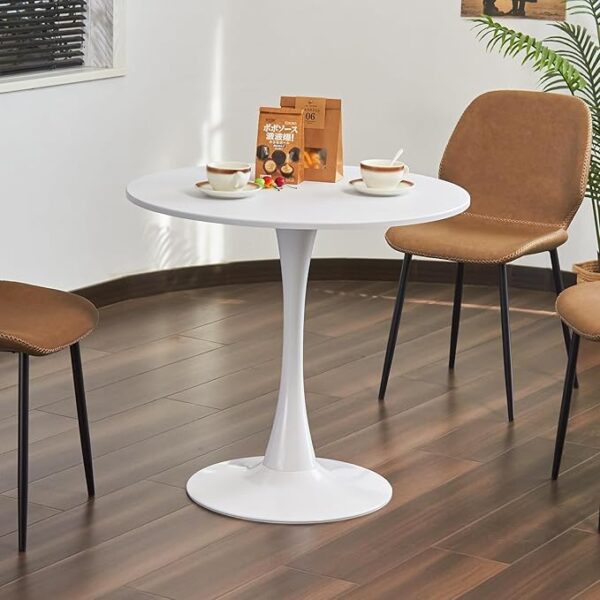 White round modern dining table with a glossy surface and minimalist design, ideal for contemporary homes.