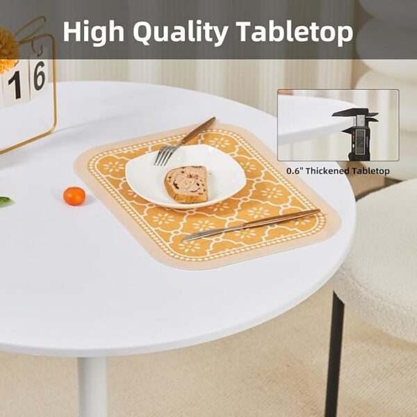 White round modern dining table with a glossy surface and minimalist design, ideal for contemporary homes.