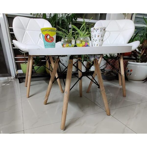 Faux Leather White Eames Dining Chair with ergonomic seat and wooden cross-frame base.