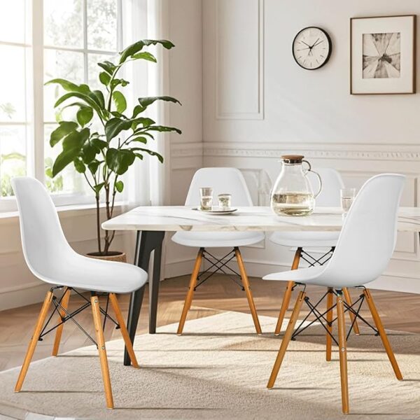 Molded Plastic Eames Dining Chair with a contoured plastic seat and wooden legs, offering modern style and comfort for dining or office spaces.