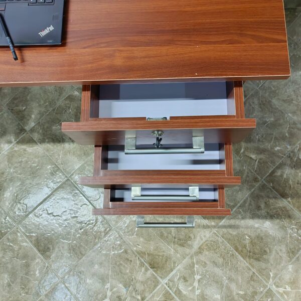 1.2 Meter Wooden Office Computer Desk with a sturdy construction and spacious surface, ideal for home and office workspaces.