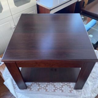 Casual Executive Mahogany Coffee Table with sleek design and rich mahogany finish.