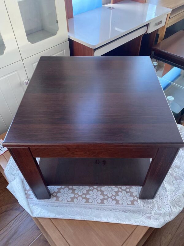 Casual Executive Mahogany Coffee Table with sleek design and rich mahogany finish.