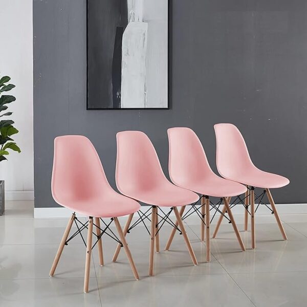 Modern Armless Eames Dining Chair with molded plastic seat and wooden dowel legs, offering a sleek and ergonomic design for contemporary dining spaces.