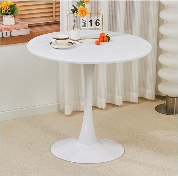 White round modern dining table with a glossy surface and minimalist design, ideal for contemporary homes.