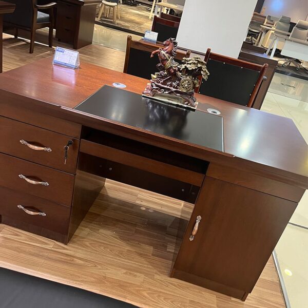 140cm Executive Mahogany Writing Desk featuring a spacious writing surface and stylish storage drawers, crafted from rich mahogany wood.