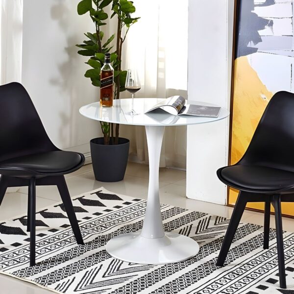 Round Marble Top Dining Table with a sleek design, adding elegance to a modern dining room.