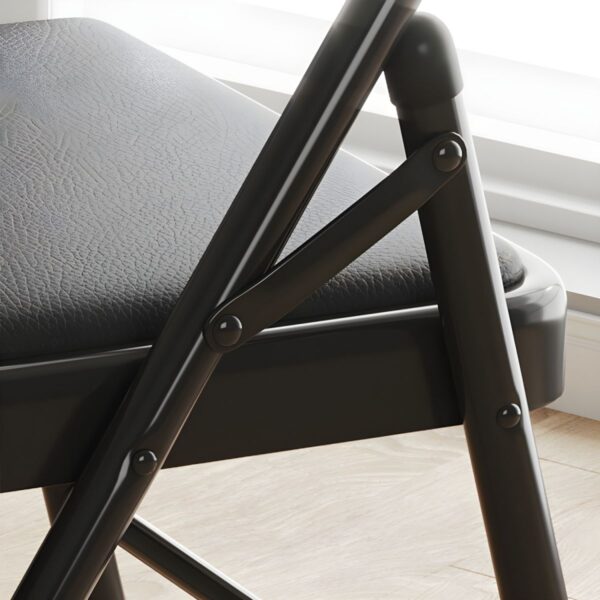 Black Folding Armless Office Chair with a sleek design, foldable frame, and non-adjustable height for versatile seating.