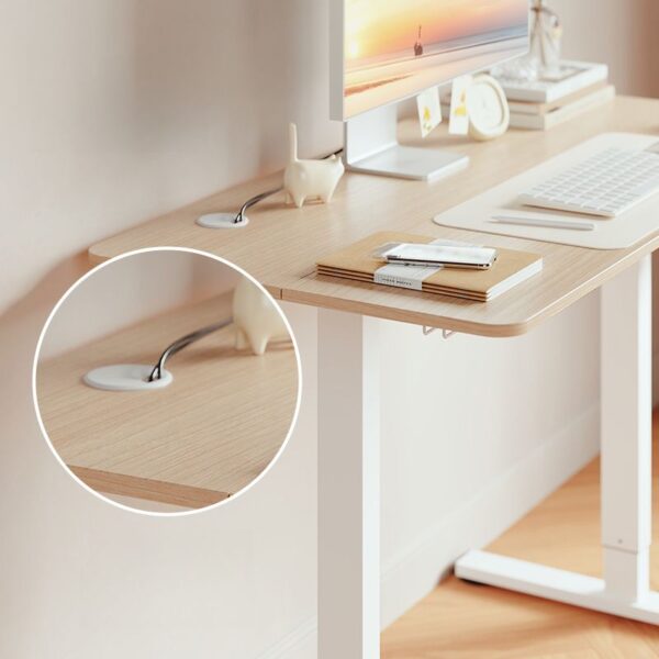 Modern Height-Adjustable Office Desk with motorized height control and sleek design for ergonomic comfort.