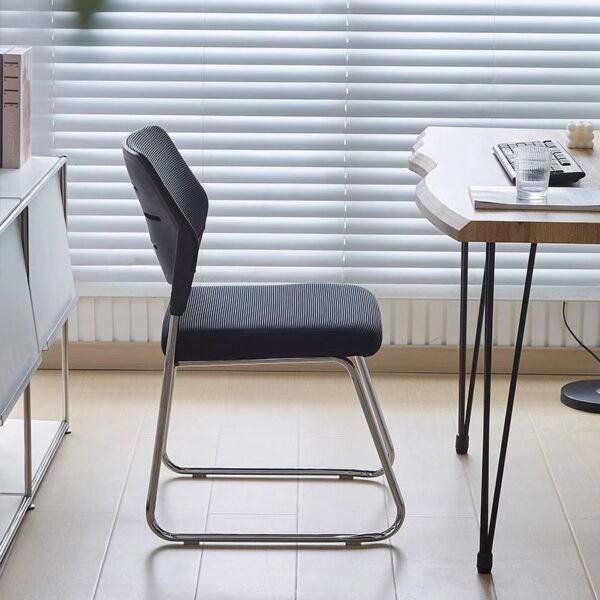 Mid Back Mesh Conference Chair with breathable back, padded seat, and adjustable height for comfort and support.