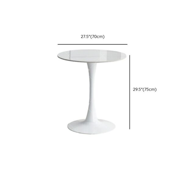 Modern White Marble Dining Table with sleek round top and sturdy base, adding elegance to any dining space.