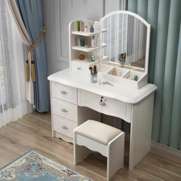 Modern Wood Makeup Vanity Table with a sleek design, spacious tabletop, built-in mirror, and storage drawers in a stylish bedroom setting.