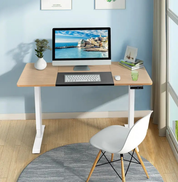 140cm Height Adjustable Standing Desk with a spacious surface and modern, minimalist design.