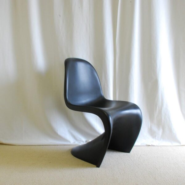 Mid-Century Modern Panton Plastic Chair with a smooth, curvaceous design in modern home or office décor.