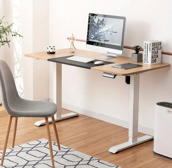 140cm Height Adjustable Standing Desk with a spacious surface and modern, minimalist design.