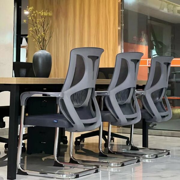 Modern high-back mesh conference seat with a breathable mesh back, chrome base, and ergonomic design for comfort during meetings.