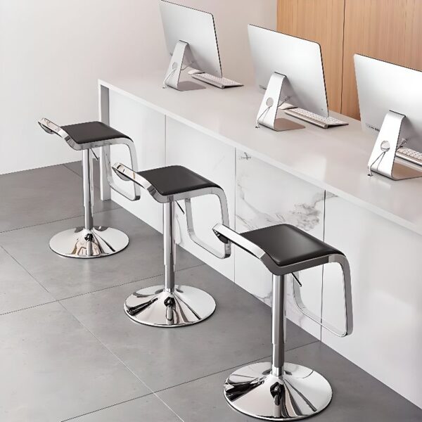 Casual metallic rectangular bar stool with a cushioned seat and sleek frame, perfect for modern kitchens or home bars.