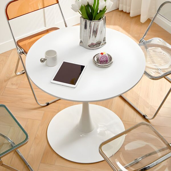 Round Manufactured Wood Dining Table with a sleek, modern design, ideal for any dining room or kitchen setting.