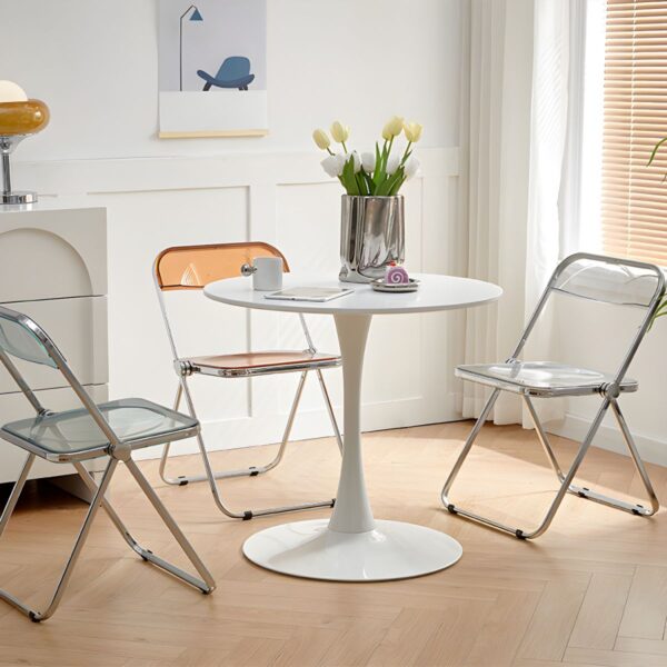 Round Manufactured Wood Dining Table with a sleek, modern design, ideal for any dining room or kitchen setting.