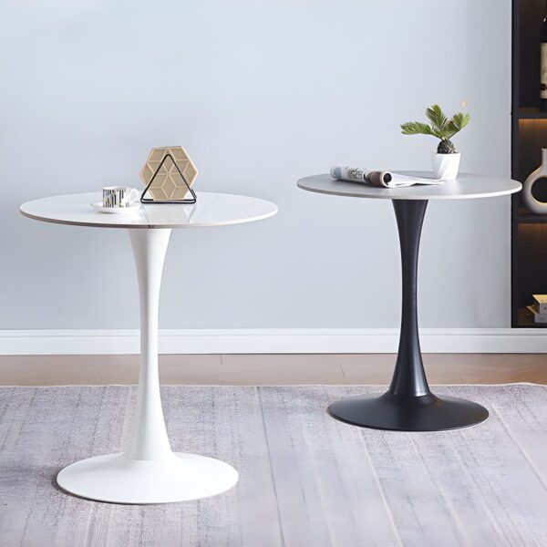 The Round Tulip Home Office Dinner Table features a sleek white tabletop and a unique tulip-shaped base. Ideal for dining or working, it adds modern elegance to any home or office space.