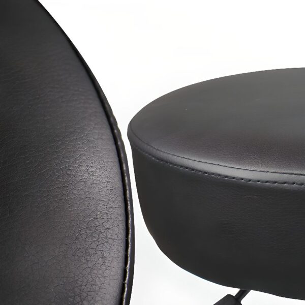 Portable Swivel Leather Backless Stool with a durable leather surface and swivel function, offering versatile and compact seating.