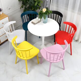 Plastic dining chair with ergonomic design, lightweight frame, and modern aesthetic, ideal for home and office use.