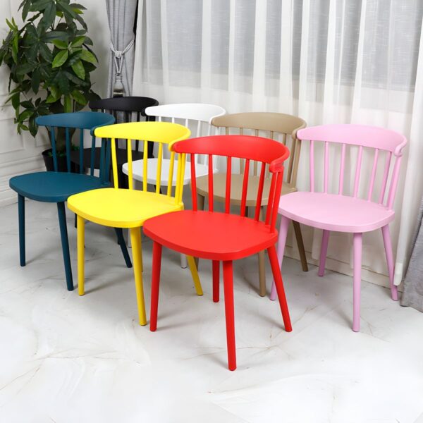 Plastic dining chair with ergonomic design, lightweight frame, and modern aesthetic, ideal for home and office use.