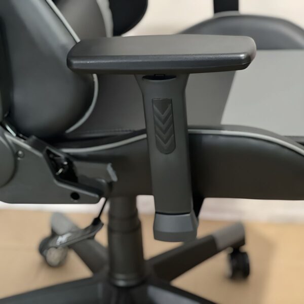 Office Leather Modern Gaming Chair with ergonomic design, adjustable features, and smooth-rolling casters for ultimate comfort in both work and gaming settings.