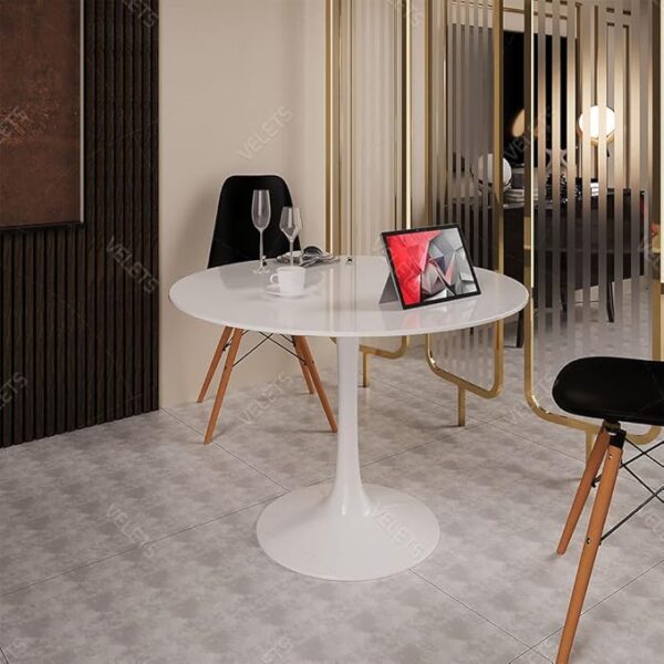 Round White Marble Dining Table with gray veining and a sleek metal base, designed for modern dining rooms.