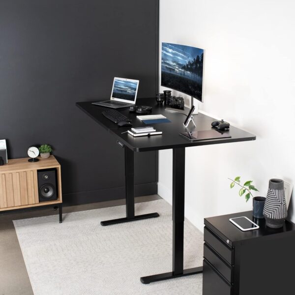 140cm Memory Controller Standing Desk with adjustable height and spacious surface for improved ergonomics and comfort.