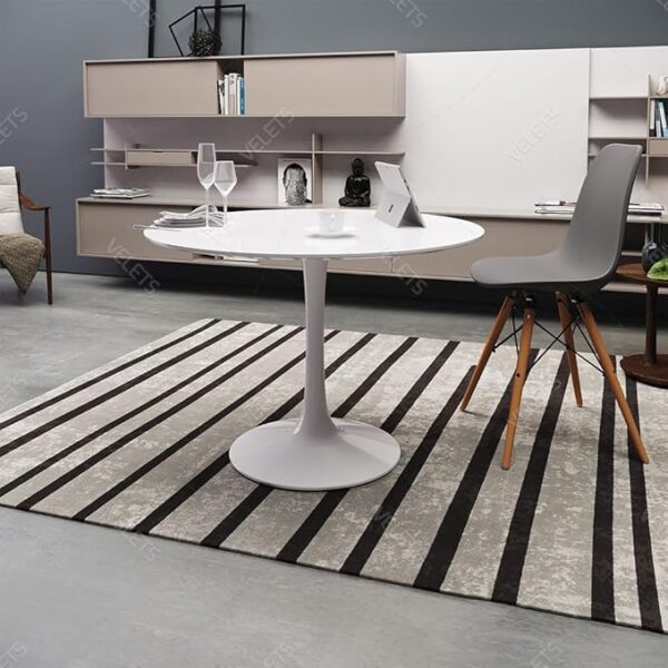 Round White Marble Dining Table with gray veining and a sleek metal base, designed for modern dining rooms.