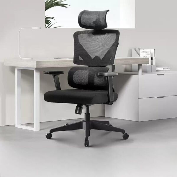 High back office chair with ergonomic and orthopedic support, adjustable armrests, and breathable fabric for comfort during long hours of sitting.