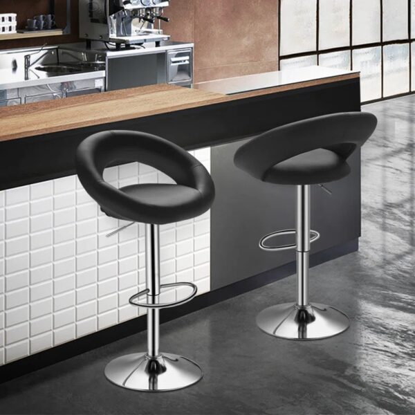 Adjustable Leather Counter Dining Barstool with a cushioned seat, modern design, and adjustable height, ideal for kitchen islands or home bars.