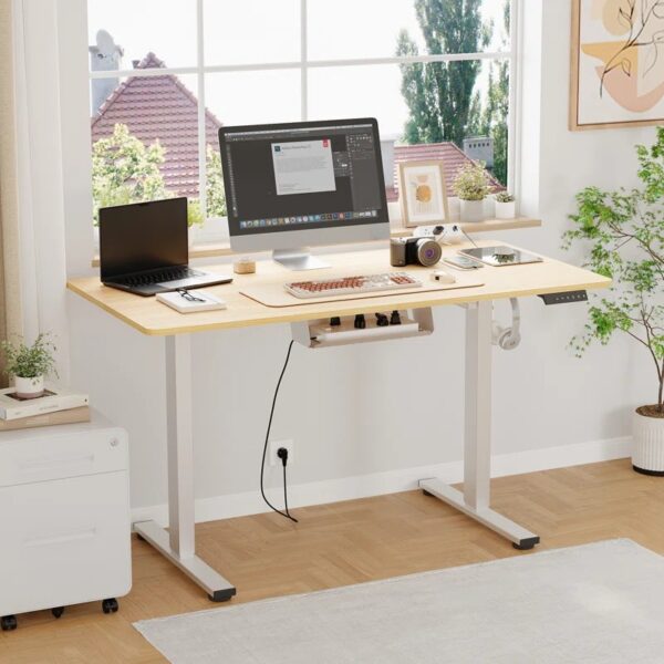 1.4 Meters Modern Electric Standing Desk with adjustable height, providing ergonomic support for sitting and standing positions.