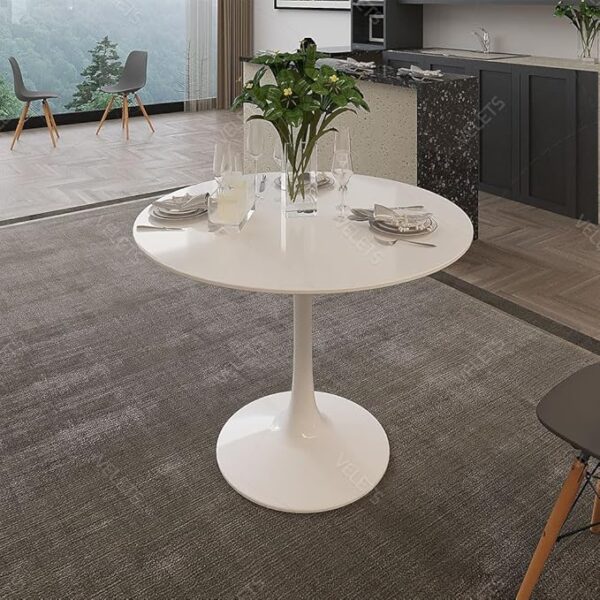 Round White Marble Dining Table with gray veining and a sleek metal base, designed for modern dining rooms.