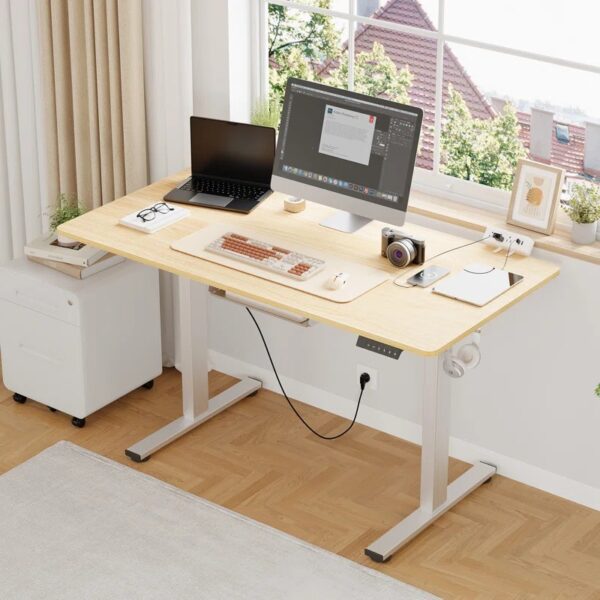 1.4 Meters Modern Electric Standing Desk with adjustable height, providing ergonomic support for sitting and standing positions.