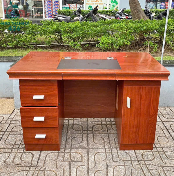 A 140cm Office Executive Desk with a sleek design, spacious surface, and built-in storage, perfect for a professional office environment.