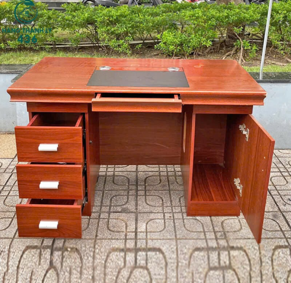 A 140cm Office Executive Desk with a sleek design, spacious surface, and built-in storage, perfect for a professional office environment.