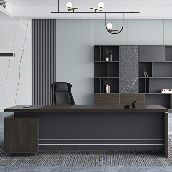 Command Attention, Drive Productivity Redefine your workspace with the 1.8 Meter Executive Office Desk, designed to make a bold statement while offering functional excellence. With a generous desktop, refined finishes, and integrated storage solutions, this desk is ideal for executives, managers, and professionals who demand both style and performance. Whether in a corporate office or a high-end home setup, this desk enhances focus, organization, and executive presence. Spacious Desktop for Seamless Workflow With a width of 1800mm (1.8 meters), this desk provides a wide surface to accommodate multiple monitors, documents, desktop organizers, and more — without feeling cluttered. The expansive layout makes multitasking easier, whether you're in meetings, reviewing reports, or working on creative projects. Its generous surface area encourages a clean, organized workspace, boosting both efficiency and confidence. Sophisticated Design Meets Lasting Durability Crafted with high-quality engineered wood, MDF, or laminated veneer, the 1.8m executive desk is built to withstand daily wear while maintaining a premium, professional appearance. Its scratch- and stain-resistant surface ensures longevity, while elegant finishes such as walnut, espresso, matte black, or oak help complement any office décor. Optional features like modesty panels, metal legs, or wooden frames add structure and sophistication to your setup. Integrated Storage and Cable Management This desk doesn’t just look good — it works smart, too. Choose models with lockable drawers, filing cabinets, or side returns for extra storage. Built-in cable management holes or grommets help keep wires tidy and out of sight, so your workspace stays clean and distraction-free. Key Features 📏 Spacious 1.8-Meter Desktop: Ideal for executive offices and multi-device setups. 🪵 Premium Construction: Built from engineered wood or MDF with durable, laminated finishes. 🗄️ Integrated Storage Options: Includes drawers or return cabinets for files and supplies. 🧼 Scratch & Stain Resistant: Easy-to-clean surfaces ensure a polished look at all times. 🎨 Executive Finishes: Available in walnut, espresso, black, white, oak, and more. 🔐 Secure Storage (Optional): Lockable drawers for confidential documents and personal items. 🧩 Cable Management: Grommets or cable channels help maintain a clutter-free desktop. 🪑 Ergonomic Design: Standard 750mm height for optimal comfort with office chairs. 🛠️ Easy Assembly: Shipped flat-packed with instructions or available with professional installation. Perfect for Leadership Offices, Corporate Suites & Home Workspaces From C-suite offices to high-end home setups, the 1.8 Meter Executive Desk fits seamlessly into any professional environment. Its combination of spaciousness, sophistication, and storage makes it ideal for anyone needing an organized, stylish workspace that supports productivity.