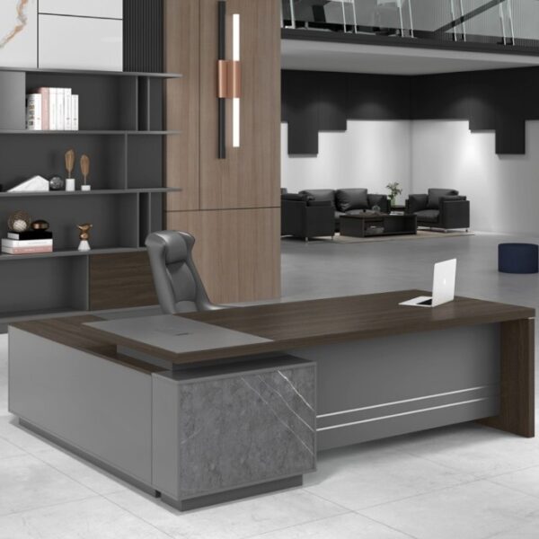 Command Attention, Drive Productivity Redefine your workspace with the 1.8 Meter Executive Office Desk, designed to make a bold statement while offering functional excellence. With a generous desktop, refined finishes, and integrated storage solutions, this desk is ideal for executives, managers, and professionals who demand both style and performance. Whether in a corporate office or a high-end home setup, this desk enhances focus, organization, and executive presence. Spacious Desktop for Seamless Workflow With a width of 1800mm (1.8 meters), this desk provides a wide surface to accommodate multiple monitors, documents, desktop organizers, and more — without feeling cluttered. The expansive layout makes multitasking easier, whether you're in meetings, reviewing reports, or working on creative projects. Its generous surface area encourages a clean, organized workspace, boosting both efficiency and confidence. Sophisticated Design Meets Lasting Durability Crafted with high-quality engineered wood, MDF, or laminated veneer, the 1.8m executive desk is built to withstand daily wear while maintaining a premium, professional appearance. Its scratch- and stain-resistant surface ensures longevity, while elegant finishes such as walnut, espresso, matte black, or oak help complement any office décor. Optional features like modesty panels, metal legs, or wooden frames add structure and sophistication to your setup. Integrated Storage and Cable Management This desk doesn’t just look good — it works smart, too. Choose models with lockable drawers, filing cabinets, or side returns for extra storage. Built-in cable management holes or grommets help keep wires tidy and out of sight, so your workspace stays clean and distraction-free. Key Features 📏 Spacious 1.8-Meter Desktop: Ideal for executive offices and multi-device setups. 🪵 Premium Construction: Built from engineered wood or MDF with durable, laminated finishes. 🗄️ Integrated Storage Options: Includes drawers or return cabinets for files and supplies. 🧼 Scratch & Stain Resistant: Easy-to-clean surfaces ensure a polished look at all times. 🎨 Executive Finishes: Available in walnut, espresso, black, white, oak, and more. 🔐 Secure Storage (Optional): Lockable drawers for confidential documents and personal items. 🧩 Cable Management: Grommets or cable channels help maintain a clutter-free desktop. 🪑 Ergonomic Design: Standard 750mm height for optimal comfort with office chairs. 🛠️ Easy Assembly: Shipped flat-packed with instructions or available with professional installation. Perfect for Leadership Offices, Corporate Suites & Home Workspaces From C-suite offices to high-end home setups, the 1.8 Meter Executive Desk fits seamlessly into any professional environment. Its combination of spaciousness, sophistication, and storage makes it ideal for anyone needing an organized, stylish workspace that supports productivity.