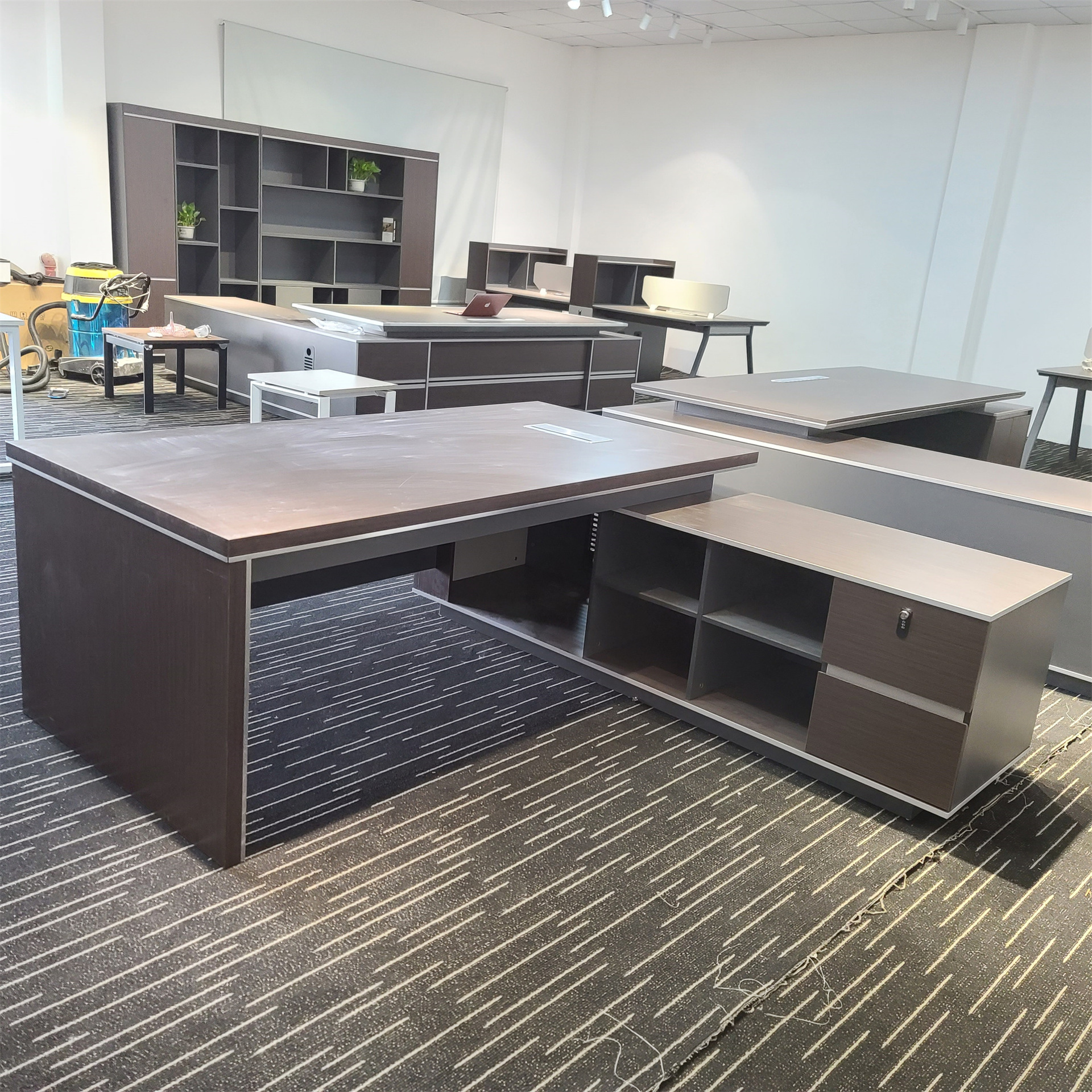 1.8 meters executive L-shaped desk, 1.8m executive L-shaped desk, executive L-shaped desk 1.8m, large L-shaped executive desk, office L-shaped desk 1.8 meters, corner executive desk 1.8m, L-shaped office table 1.8m, 180cm executive L desk, spacious L-shaped executive desk, luxury executive L-shaped desk, premium L-shaped office desk, corporate L-shaped desk 1.8m, professional L-shaped executive table, modern L-shaped executive desk, durable L-shaped desk 1.8m, ergonomic L-shaped office desk 1.8m, wooden L-shaped executive desk 1.8m (generic), laminate L-shaped desk 1.8m (generic), melamine L-shaped executive desk 1.8m (generic), L-shaped desk with return 1.8m, left-hand L-shaped desk 1.8m, right-hand L-shaped desk 1.8m, reversible L-shaped executive desk, office workstation L-shaped 1.8m, executive office corner workstation 1.8m, CEO L-shaped desk, director L-shaped desk 1.8m, manager L-shaped office desk 1.8 meters, luxury L-shaped workstation 1.8m, business executive L-shaped desk, corporate office table L-shaped 1.8m, L-shaped desk with drawers 1.8m, L-shaped desk with storage 1.8 meters, pedestal L-shaped desk 1.8m, L-shaped desk with cabinet 1.8m, L-shaped office desk with shelves 1.8m, workspace L-shaped desk 1.8m, productivity L-shaped desk 1.8m, workstation system L-shaped 1.8m, L-shaped meeting desk 1.8m, executive computer desk L-shape 1.8m, executive desk with cable management 1.8m, wire management L-shaped desk (generic), grommet hole L-shaped desk (generic), cable port L-shaped desk 1.8m (generic), sturdy L-shaped executive desk 1.8m, heavy-duty L-shaped office desk 1.8m, stable L-shaped wooden desk 1.8m (generic), scratch-resistant L-shaped desk (generic), waterproof L-shaped executive desk (generic), modern office corner table 1.8m, L-shaped management desk 1.8m, executive workspace desk 1.8m, organizational executive desk 1.8m, functional L-shaped desk 1.8 meters, spacious executive desk 1.8m, large surface L-shaped desk 1.8m, multitasking L-shaped workspace 1.8m, office workstation table L-shape 1.8m, home office L-shaped desk 1.8m, office furniture L-shaped executive design, premium grade L-shaped desk 1.8m, contemporary L-shaped office workstation, minimalist L-shaped executive desk, designer L-shaped office table, elegant L-shaped desk 1.8m, sophisticated L-shaped executive workstation, executive office furniture L-shaped 1.8m, wood finish L-shaped desk 1.8m (generic), dark wood executive L-shaped desk (generic), walnut finish L-shaped desk 1.8m (generic), oak finish L-shaped desk 1.8m (generic), mahogany L-shaped executive desk (generic), teak finish L-shaped desk 1.8m (generic), black L-shaped executive desk 1.8m (generic), white L-shaped office desk 1.8m (generic), grey executive L-shaped desk 1.8m (generic), two-tone L-shaped desk 1.8m, dual color executive desk 1.8m, high-capacity L-shaped desk 1.8m, broad work surface L-shaped desk 1.8m, 1.8 meter corner desk, L-shaped supervisor desk 1.8m, L-shaped administrative desk 1.8m, executive suite L-shaped desk 1.8m, office command desk L-shape 1.8m, workstation cluster L-shaped 1.8m, ergonomic corner desk 1.8m, extended return L-shaped desk 1.8m, L-shaped desk with CPU cabinet 1.8m (generic), L-shaped desk with filing drawer 1.8m (generic), legal size drawer desk 1.8m (generic), office desk with lockable drawer 1.8m (generic), secure L-shaped desk 1.8m, lockable storage L-shaped desk (generic), premium executive workspace 1.8m, CEO office furniture L-shaped 1.8m, leadership desk L-shape 1.8m, corner workstation executive 1.8 meters, headquarters office desk L-shape 1.8m, boardroom L-shaped desk 1.8m, decision-maker office desk L-shape 1.8m, professional office L-shaped workstation, strategic office desk L-shaped 1.8m, firm executive desk L-shaped 1.8m, modern working desk L-shape 1.8m, open-plan office L-shaped desk 1.8m, hybrid workspace L-shaped desk 1.8m, multi-use L-shaped office table 1.8m, business desk L-shaped 1.8m, enterprise executive desk L-shape 1.8m, commercial-grade L-shaped desk 1.8m, heavy-use executive desk L-shape 1.8m, contract-grade L-shaped desk (generic), company office L-shaped table 1.8m, corporate interior desk 1.8m, office cabin L-shaped desk 1.8m, chamber desk L-shaped 1.8m, workstation optimization desk 1.8m, productivity-enhancing L-shaped desk 1.8m, efficiency-focused desk L-shape 1.8m, executive desk with return 1.8m, return table L-shaped 1.8 meters, left return executive desk 1.8m, right return executive desk 1.8m, L-shaped station desk 1.8m, office desk system L-shaped 1.8m, office corner furniture 1.8m, L-shaped office computer table 1.8m, L-shaped writing desk 1.8m, office drafting L-shaped desk 1.8m (generic), multi-purpose L-shaped desk 1.8m, dual monitor L-shaped desk 1.8m, triple monitor L-shaped desk 1.8m (generic), workstation table 1.8m L-shaped, executive desk with full return 1.8m, corner office desk premium 1.8m, L-shaped desk for executives and managers, work-from-office L-shaped desk 1.8m, chief executive desk L-shaped 1.8m, administrative furniture L-shape 1.8m, top-tier L-shaped desk 1.8m, high-class executive desk 1.8m, sophisticated L-shaped workstation 1.8m, luxury-grade office desk L-shaped 1.8m, business-class executive desk L-shape 1.8m, company director desk L-shaped 1.8m, executive business table L-shape 1.8m, work suite L-shaped desk 1.8m, office panel L-shaped desk 1.8m, workstation panel return 1.8m, durable office workstation 1.8m, reinforced executive desk L-shaped 1.8m, robust L-shaped desk 1.8m, stable executive desk L-shape 1.8m, anti-scratch surface L-shaped desk (generic), moisture-resistant L-shaped desk (generic), stain-resistant executive desk (generic), easy-clean L-shaped desk (generic), commercial laminate L-shaped desk (generic), thick board L-shaped desk 1.8m (generic), heavy panel L-shaped desk 1.8m, office table executive L shape 1.8m, management office desk L-shaped 1.8m, office leadership desk L-shape 1.8m, top management desk L-shape 1.8 meters, company owner desk L-shaped 1.8m, professional corner workstation 1.8m, compact executive L-shaped desk 1.8m, spacious office L-shaped workstation 1.8m, modular L-shaped executive table 1.8m, modular return desk 1.8m, reconfigurable L-shaped desk 1.8m (generic), ergonomic corner executive table 1.8m, employee executive desk L-shape 1.8m, extended work surface desk 1.8m, extra-wide L-shaped desk 1.8m, rectangular + return desk 1.8m, hybrid L-shaped desk 1.8m, left configuration desk 1.8m, right configuration desk 1.8m, L-shaped workstation with executive finish, premium top desk L-shaped 1.8m, scratchproof executive table (generic), polished finish L-shaped desk (generic), high finish executive desk L-shape 1.8m, matte finish L-shaped desk 1.8m (generic), office corner synergy desk 1.8m, executive office organizing desk 1.8m, workspace enhancement desk 1.8m, productivity corner desk 1.8m, professional working corner 1.8m desk, office decor matching desk L-shape 1.8m, workstation furniture 1.8m L-shaped, company workspace desk L-shaped 1.8m, commercial office setup desk 1.8m, executive productivity desk L-shape 1.8m, dual-surface L-shaped desk 1.8m, angled workstation desk 1.8m, 90-degree L-shaped desk 1.8m, wide return corner desk 1.8m, full-width L-shaped executive desk, meeting-friendly L-shaped desk 1.8m, collaboration L-shaped desk 1.8m, interview executive desk L-shape 1.8m, corporate meeting L-shaped table 1.8m, writing workspace L-shaped 1.8m, documentation desk L-shaped 1.8m, research desk L-shaped 1.8m, tech workstation L-shaped desk 1.8m, office PC desk L-shape 1.8m, laptop desk L-shape 1.8m, desktop workstation 1.8m L-shaped, home office replacement L-shaped desk 1.8m, professional ergonomic desk 1.8m, office corner ergonomic setup 1.8m, adjustable L-shaped desk 1.8m (generic), height-standard L-shaped desk 1.8m, multi-functional L-shaped workstation 1.8m, optimized workspace desk 1.8m, designer executive desk L-shaped 1.8m, trend-setting office desk L-shape 1.8m, premium corporate desk 1.8m L-shaped, office furniture 180cm L-shaped, multifunction executive corner desk 1.8m, top-performing L-shaped desk 1.8m, employee performance desk L-shaped 1.8m, workstation-enhancing desk 1.8m, business furniture L-shaped 1.8m, durable top desk L-shaped 1.8m, reliable L-shaped desk 1.8m, office renovation L-shaped desk 1.8m, office upgrade desk L-shaped 1.8m, new office desk L-shaped 1.8m, replacement executive desk 1.8m, productivity-focused executive table 1.8m.