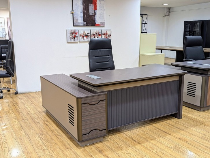 executive 180cm L-shaped office table, 180cm executive office table, L shaped executive desk 180cm, executive L shape office desk, 180cm office table L shape, executive corner office table, L shaped directors office table, executive office workstation L shape, modern executive L shaped desk, luxury executive office table 180cm, professional executive desk L shape, corporate executive office table, CEO L shaped office table, directors L shape office desk, manager executive L shaped table, premium executive office desk 180cm, ergonomic executive L shaped desk, large executive office table L shape, spacious executive desk 180cm, wooden executive L shaped office table, laminated executive office desk L shape, MDF executive L shaped table, veneer finish executive desk 180cm, solid wood executive L shaped desk, contemporary executive office table, modern office furniture executive desk, executive desk with side return 180cm, executive workstation with storage, executive table with drawers L shape, executive table with pedestal 180cm, executive desk with cabinet L shape, executive office table with modesty panel, executive table with cable management, executive desk with wire grommets, office desk for executives 180cm, executive writing table L shape, executive computer desk 180cm, executive office desk for professionals, high end executive office table, stylish executive L shaped desk, elegant executive office table 180cm, minimalist executive L shape desk, classic executive office desk, executive boss table L shape, executive director office table 180cm, leadership office desk L shape, senior management office table, executive table for cabin office, executive desk for private office, executive workstation for corporate office, executive office furniture desk, premium office desk for executives, executive desk with return unit, executive table with storage drawers, executive desk with lockable drawers, executive office desk with CPU space, executive office table with keyboard tray, executive office desk with shelves, executive desk for productivity, executive desk for long working hours, executive table with strong frame, heavy duty executive L shaped desk, durable executive office table, scratch resistant executive desk 180cm, water resistant executive office table, modern wooden executive desk L shape, walnut finish executive office table, oak finish executive L shaped desk, teak finish executive office table, wenge finish executive desk, black executive L shaped office desk, brown executive office table 180cm, white executive L shaped desk, dual tone executive office desk, office furniture executive L shape table, executive desk for corporate interiors, executive desk for modern offices, executive desk for luxury offices, executive desk for IT office cabin, executive desk for startup office, executive desk for enterprise office, executive desk for professional workspace, executive desk for office cabin setup, executive L shaped desk with side storage, executive table with filing cabinet, executive office desk with storage unit, executive workstation table L shape, executive office desk with premium finish, executive table for boardroom cabin, executive desk with privacy panel, executive office desk solution, executive L shaped office furniture, executive desk for management offices, executive office desk for directors cabin, executive desk with ergonomic layout, executive office desk with wide tabletop, executive desk with ample legroom, executive desk with balanced design, executive office desk with modern aesthetics