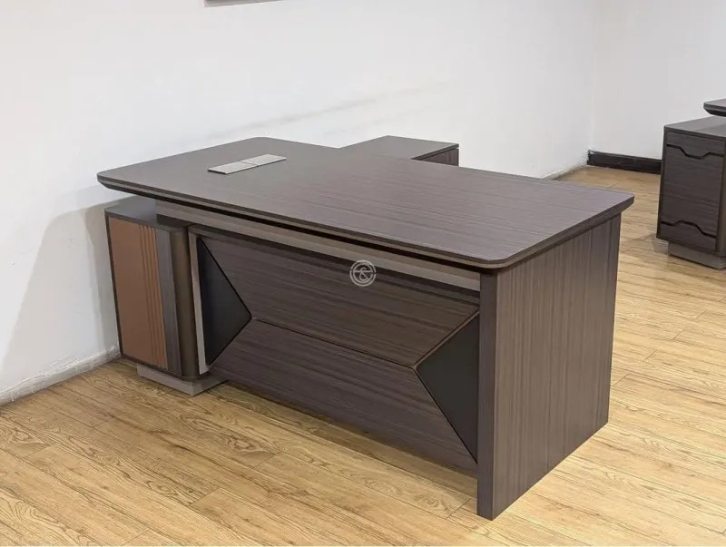 executive 180cm L-shaped office table, 180cm executive office table, L shaped executive desk 180cm, executive L shape office desk, 180cm office table L shape, executive corner office table, L shaped directors office table, executive office workstation L shape, modern executive L shaped desk, luxury executive office table 180cm, professional executive desk L shape, corporate executive office table, CEO L shaped office table, directors L shape office desk, manager executive L shaped table, premium executive office desk 180cm, ergonomic executive L shaped desk, large executive office table L shape, spacious executive desk 180cm, wooden executive L shaped office table, laminated executive office desk L shape, MDF executive L shaped table, veneer finish executive desk 180cm, solid wood executive L shaped desk, contemporary executive office table, modern office furniture executive desk, executive desk with side return 180cm, executive workstation with storage, executive table with drawers L shape, executive table with pedestal 180cm, executive desk with cabinet L shape, executive office table with modesty panel, executive table with cable management, executive desk with wire grommets, office desk for executives 180cm, executive writing table L shape, executive computer desk 180cm, executive office desk for professionals, high end executive office table, stylish executive L shaped desk, elegant executive office table 180cm, minimalist executive L shape desk, classic executive office desk, executive boss table L shape, executive director office table 180cm, leadership office desk L shape, senior management office table, executive table for cabin office, executive desk for private office, executive workstation for corporate office, executive office furniture desk, premium office desk for executives, executive desk with return unit, executive table with storage drawers, executive desk with lockable drawers, executive office desk with CPU space, executive office table with keyboard tray, executive office desk with shelves, executive desk for productivity, executive desk for long working hours, executive table with strong frame, heavy duty executive L shaped desk, durable executive office table, scratch resistant executive desk 180cm, water resistant executive office table, modern wooden executive desk L shape, walnut finish executive office table, oak finish executive L shaped desk, teak finish executive office table, wenge finish executive desk, black executive L shaped office desk, brown executive office table 180cm, white executive L shaped desk, dual tone executive office desk, office furniture executive L shape table, executive desk for corporate interiors, executive desk for modern offices, executive desk for luxury offices, executive desk for IT office cabin, executive desk for startup office, executive desk for enterprise office, executive desk for professional workspace, executive desk for office cabin setup, executive L shaped desk with side storage, executive table with filing cabinet, executive office desk with storage unit, executive workstation table L shape, executive office desk with premium finish, executive table for boardroom cabin, executive desk with privacy panel, executive office desk solution, executive L shaped office furniture, executive desk for management offices, executive office desk for directors cabin, executive desk with ergonomic layout, executive office desk with wide tabletop, executive desk with ample legroom, executive desk with balanced design, executive office desk with modern aesthetics