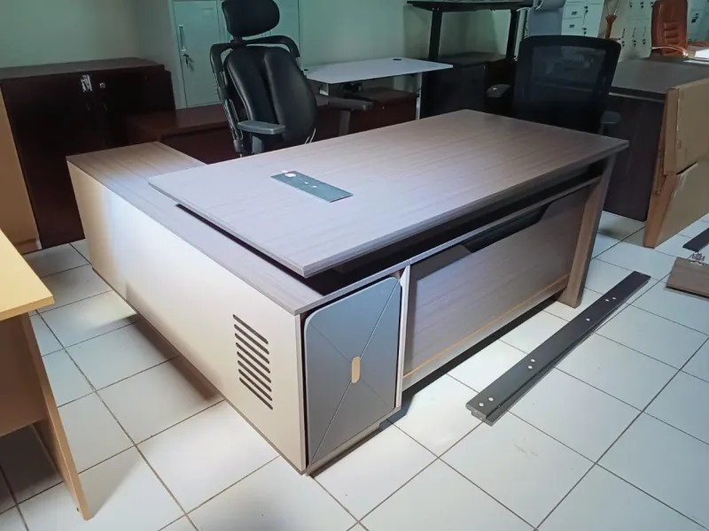 executive L-shaped table, executive L-shaped desk, L-shaped executive office table, executive corner desk, executive corner table, L-shaped director table, L-shaped manager desk, CEO L-shaped office table, luxury executive L-shaped desk, modern executive L-shaped table, contemporary executive corner desk, executive workstation L-shaped table, executive L-shaped desk with drawers, executive L-shaped desk with storage, executive L-shaped desk with cabinets, executive L-shaped desk with return, executive L-shaped table with side cabinet, executive L-shaped table with pedestal drawers, executive L-shaped desk with modesty panel, executive L-shaped table with cable management, ergonomic executive L-shaped desk, executive L-shaped table for corporate office, executive L-shaped desk for home office, executive L-shaped table for manager cabin, executive L-shaped desk for director office, executive L-shaped table for executive suite, professional executive table, high-end executive corner workstation, heavy duty executive L-shaped table, commercial executive L-shaped desk, executive L-shaped desk with wooden finish, executive L-shaped desk with laminate top, executive L-shaped desk with glass top, executive L-shaped desk with metal frame, executive L-shaped table with reinforced frame, executive L-shaped desk with spacious tabletop, executive L-shaped desk with ample legroom, executive L-shaped desk with lockable drawers, executive L-shaped desk for dual monitor setup, executive L-shaped desk for collaborative workspace, executive L-shaped desk for small office, executive L-shaped desk for large office, executive L-shaped desk with contemporary styling, executive L-shaped desk with sleek design, executive L-shaped desk with premium finish, executive L-shaped desk with durable construction, executive L-shaped desk with smooth surface, executive L-shaped desk with multi-level storage, executive L-shaped desk with reinforced drawers, executive L-shaped desk with heavy duty base, executive L-shaped desk with stable support, executive L-shaped desk with ergonomic layout, executive L-shaped desk with executive styling, executive L-shaped desk for leadership workspace, executive L-shaped desk for strategic planning, executive L-shaped desk with large storage capacity, executive L-shaped desk with multi-purpose surface, executive L-shaped desk for corporate interiors, executive L-shaped desk with refined design, executive L-shaped desk with long-lasting durability, executive L-shaped desk for professional environment, executive L-shaped desk with high-quality craftsmanship, executive L-shaped desk for executive cabin, executive L-shaped desk with minimalist aesthetics, executive L-shaped desk for productivity, executive L-shaped desk for creative workspace, executive L-shaped desk with elegant wood finish, executive L-shaped desk with stylish modern frame, executive L-shaped desk with reinforced corner support, executive L-shaped desk with ergonomic seating arrangement, executive L-shaped desk for home and office use, executive L-shaped desk with functional storage, executive L-shaped desk with professional styling, executive L-shaped desk with sleek professional look, executive L-shaped desk for high-profile offices, executive L-shaped desk with contemporary office aesthetics, executive L-shaped desk for modern office interiors, executive L-shaped desk with practical workspace layout, executive L-shaped desk with durable laminate surface, executive L-shaped desk for CEO office, executive L-shaped desk for managerial office, executive L-shaped desk for corporate decision-making, executive L-shaped desk with stylish appearance, executive L-shaped desk with polished professional design, executive L-shaped desk with integrated storage cabinet, executive L-shaped desk with side return extension, executive L-shaped desk with premium materials and finish.