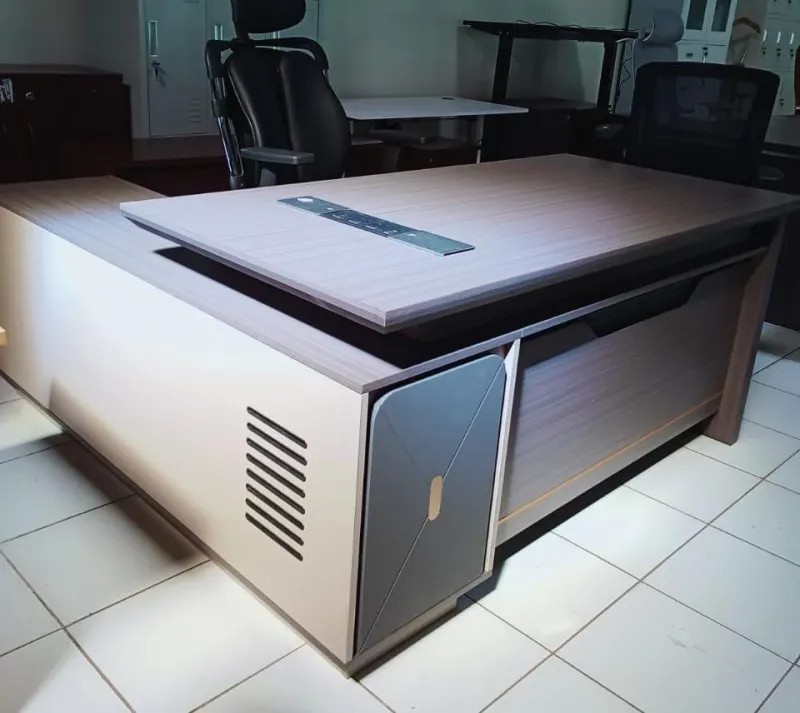 executive L-shaped table, executive L-shaped desk, L-shaped executive office table, executive corner desk, executive corner table, L-shaped director table, L-shaped manager desk, CEO L-shaped office table, luxury executive L-shaped desk, modern executive L-shaped table, contemporary executive corner desk, executive workstation L-shaped table, executive L-shaped desk with drawers, executive L-shaped desk with storage, executive L-shaped desk with cabinets, executive L-shaped desk with return, executive L-shaped table with side cabinet, executive L-shaped table with pedestal drawers, executive L-shaped desk with modesty panel, executive L-shaped table with cable management, ergonomic executive L-shaped desk, executive L-shaped table for corporate office, executive L-shaped desk for home office, executive L-shaped table for manager cabin, executive L-shaped desk for director office, executive L-shaped table for executive suite, professional executive table, high-end executive corner workstation, heavy duty executive L-shaped table, commercial executive L-shaped desk, executive L-shaped desk with wooden finish, executive L-shaped desk with laminate top, executive L-shaped desk with glass top, executive L-shaped desk with metal frame, executive L-shaped table with reinforced frame, executive L-shaped desk with spacious tabletop, executive L-shaped desk with ample legroom, executive L-shaped desk with lockable drawers, executive L-shaped desk for dual monitor setup, executive L-shaped desk for collaborative workspace, executive L-shaped desk for small office, executive L-shaped desk for large office, executive L-shaped desk with contemporary styling, executive L-shaped desk with sleek design, executive L-shaped desk with premium finish, executive L-shaped desk with durable construction, executive L-shaped desk with smooth surface, executive L-shaped desk with multi-level storage, executive L-shaped desk with reinforced drawers, executive L-shaped desk with heavy duty base, executive L-shaped desk with stable support, executive L-shaped desk with ergonomic layout, executive L-shaped desk with executive styling, executive L-shaped desk for leadership workspace, executive L-shaped desk for strategic planning, executive L-shaped desk with large storage capacity, executive L-shaped desk with multi-purpose surface, executive L-shaped desk for corporate interiors, executive L-shaped desk with refined design, executive L-shaped desk with long-lasting durability, executive L-shaped desk for professional environment, executive L-shaped desk with high-quality craftsmanship, executive L-shaped desk for executive cabin, executive L-shaped desk with minimalist aesthetics, executive L-shaped desk for productivity, executive L-shaped desk for creative workspace, executive L-shaped desk with elegant wood finish, executive L-shaped desk with stylish modern frame, executive L-shaped desk with reinforced corner support, executive L-shaped desk with ergonomic seating arrangement, executive L-shaped desk for home and office use, executive L-shaped desk with functional storage, executive L-shaped desk with professional styling, executive L-shaped desk with sleek professional look, executive L-shaped desk for high-profile offices, executive L-shaped desk with contemporary office aesthetics, executive L-shaped desk for modern office interiors, executive L-shaped desk with practical workspace layout, executive L-shaped desk with durable laminate surface, executive L-shaped desk for CEO office, executive L-shaped desk for managerial office, executive L-shaped desk for corporate decision-making, executive L-shaped desk with stylish appearance, executive L-shaped desk with polished professional design, executive L-shaped desk with integrated storage cabinet, executive L-shaped desk with side return extension, executive L-shaped desk with premium materials and finish.