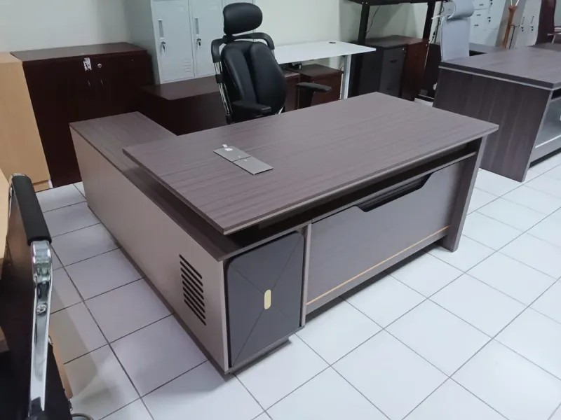 executive L-shaped table, executive L-shaped desk, L-shaped executive office table, executive corner desk, executive corner table, L-shaped director table, L-shaped manager desk, CEO L-shaped office table, luxury executive L-shaped desk, modern executive L-shaped table, contemporary executive corner desk, executive workstation L-shaped table, executive L-shaped desk with drawers, executive L-shaped desk with storage, executive L-shaped desk with cabinets, executive L-shaped desk with return, executive L-shaped table with side cabinet, executive L-shaped table with pedestal drawers, executive L-shaped desk with modesty panel, executive L-shaped table with cable management, ergonomic executive L-shaped desk, executive L-shaped table for corporate office, executive L-shaped desk for home office, executive L-shaped table for manager cabin, executive L-shaped desk for director office, executive L-shaped table for executive suite, professional executive table, high-end executive corner workstation, heavy duty executive L-shaped table, commercial executive L-shaped desk, executive L-shaped desk with wooden finish, executive L-shaped desk with laminate top, executive L-shaped desk with glass top, executive L-shaped desk with metal frame, executive L-shaped table with reinforced frame, executive L-shaped desk with spacious tabletop, executive L-shaped desk with ample legroom, executive L-shaped desk with lockable drawers, executive L-shaped desk for dual monitor setup, executive L-shaped desk for collaborative workspace, executive L-shaped desk for small office, executive L-shaped desk for large office, executive L-shaped desk with contemporary styling, executive L-shaped desk with sleek design, executive L-shaped desk with premium finish, executive L-shaped desk with durable construction, executive L-shaped desk with smooth surface, executive L-shaped desk with multi-level storage, executive L-shaped desk with reinforced drawers, executive L-shaped desk with heavy duty base, executive L-shaped desk with stable support, executive L-shaped desk with ergonomic layout, executive L-shaped desk with executive styling, executive L-shaped desk for leadership workspace, executive L-shaped desk for strategic planning, executive L-shaped desk with large storage capacity, executive L-shaped desk with multi-purpose surface, executive L-shaped desk for corporate interiors, executive L-shaped desk with refined design, executive L-shaped desk with long-lasting durability, executive L-shaped desk for professional environment, executive L-shaped desk with high-quality craftsmanship, executive L-shaped desk for executive cabin, executive L-shaped desk with minimalist aesthetics, executive L-shaped desk for productivity, executive L-shaped desk for creative workspace, executive L-shaped desk with elegant wood finish, executive L-shaped desk with stylish modern frame, executive L-shaped desk with reinforced corner support, executive L-shaped desk with ergonomic seating arrangement, executive L-shaped desk for home and office use, executive L-shaped desk with functional storage, executive L-shaped desk with professional styling, executive L-shaped desk with sleek professional look, executive L-shaped desk for high-profile offices, executive L-shaped desk with contemporary office aesthetics, executive L-shaped desk for modern office interiors, executive L-shaped desk with practical workspace layout, executive L-shaped desk with durable laminate surface, executive L-shaped desk for CEO office, executive L-shaped desk for managerial office, executive L-shaped desk for corporate decision-making, executive L-shaped desk with stylish appearance, executive L-shaped desk with polished professional design, executive L-shaped desk with integrated storage cabinet, executive L-shaped desk with side return extension, executive L-shaped desk with premium materials and finish.