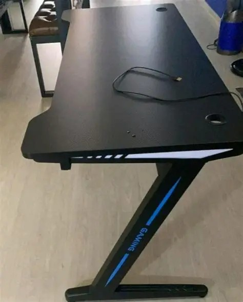 gaming desk, gaming workstation, gamer desk, gaming computer desk, RGB gaming desk, gaming setup desk, ergonomic gaming desk, gaming table, professional gaming desk, gaming furniture, gaming workstation table, gaming desk with storage, gaming desk with monitor shelf, gaming desk for PC setup, gaming room furniture, gaming battle station desk, modern gaming desk, gaming desk with cable management, gaming desk for streamers, gaming workstation furniture, gaming desk with headphone hook, gaming desk with cup holder, gaming desk for esports, gaming desk setup, gaming office desk, gaming desk for home setup, corner gaming desk, L-shaped gaming desk, compact gaming desk, large gaming desk, gaming desk for multiple monitors, gaming desk with LED lights, gaming desk with accessories, gaming furniture desk, gaming workstation setup, gaming desk for professionals, gaming desk with keyboard tray, gaming desk with carbon fiber finish, gaming room setup furniture, gaming productivity desk, gaming desk for content creators, gaming workstation solution, gaming desk with ergonomic design, gaming table for PC gamers, gaming desk for console gaming, gaming desk with sturdy frame, gaming setup furniture, gaming desk for small spaces, premium gaming desk, gaming workstation for home office, gaming desk organization, gaming desk for competitive gaming, gaming furniture solution, gaming desk with storage shelves, gaming desk for modern setups, gaming desk with durable construction, gaming room workstation, gaming desk with monitor stand, gaming desk for stream setup, gaming desk for work and play, gaming desk with spacious surface, gaming setup workstation, gaming desk for gaming accessories, gaming workstation desk furniture, gaming desk for multitasking, gaming desk with sleek design, gaming desk for productivity, gaming desk with built-in features, gaming desk for desktop computers, gaming furniture for gamers, gaming desk with modern aesthetics, gaming workstation table setup, gaming desk with adjustable feet, gaming room desk, gaming desk with organizer, gaming desk for tech enthusiasts, gaming desk for immersive setups, gaming workstation furniture solution, gaming desk with premium finish, gaming setup desk furniture, gaming desk for professional streamers, gaming desk with reinforced frame, gaming desk for entertainment rooms, gaming desk with smart cable routing, gaming workstation for gamers, gaming desk with performance-focused design, gaming desk for dual monitor setups, gaming desk with gaming accessories support, gaming desk for modern gaming environments, gaming furniture workstation, gaming desk with ergonomic workspace, gaming desk for high-performance setups.