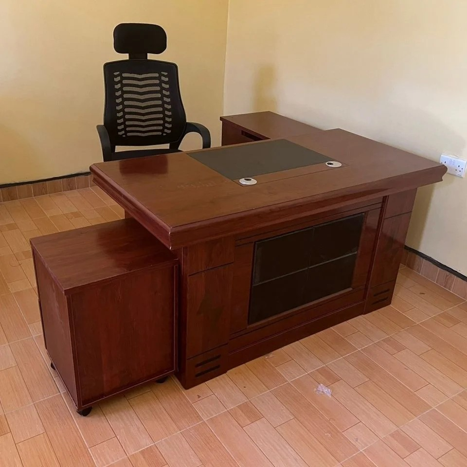 L-shaped Office Table, L-shaped office table, L shape office desk, corner office table, executive L-shaped table, office workstation table, corner workstation desk, office table, office desk, executive office table, manager desk, director desk, CEO desk, executive workstation, modern office table, wooden office table, luxury office desk, ergonomic office table, office furniture, executive furniture, office workstation, workspace desk, professional office table, corporate office furniture, business furniture, commercial office desk, large office table, office table with storage, office table with drawers, executive workstation table, contemporary office table, stylish office desk, premium office table, durable office desk, high quality office table, modular office desk, workspace furniture, office interior furniture, office setup furniture, office organization desk, office productivity desk, executive office furniture, management office desk, professional workspace furniture, corporate workspace furniture, office furnishing solutions, office desk design, executive office setup, office storage desk, cable management desk, corner office furniture, modern workspace furniture, office furniture Kenya, office furniture Nairobi, L-shaped desk Kenya, L-shaped desk Nairobi, office table Kenya, office table Nairobi, office desk Kenya, office desk Nairobi, executive furniture Kenya, executive furniture Nairobi, office furniture supplier Kenya, office furniture supplier Nairobi, workspace solutions, business workspace desk, commercial office furniture Kenya, modern executive desk, corner workstation desk, executive leadership desk, office command desk, premium workspace desk, management furniture, office workstation furniture, professional office setup, executive office environment, workspace organization furniture, office desk supplier Kenya, office desk supplier Nairobi, luxury workspace desk, corporate desk solutions, contemporary office furniture, executive workstation solutions, modern office furniture Kenya, durable workspace furniture, L-shaped executive workstation, corner office workstation, office productivity furniture.
